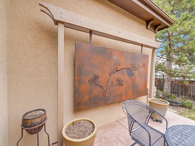 2571 Hunters Pl, Highlands Ranch, CO 80129 - exterior space featuring stucco siding and fence