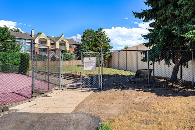 7000 E Quincy Ave Unit 204, Denver, CO 80237 - view of yard featuring a gate and fence