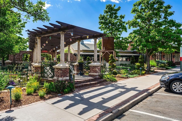 7000 E Quincy Ave Unit 204, Denver, CO 80237 - view of patio with a pergola and fence