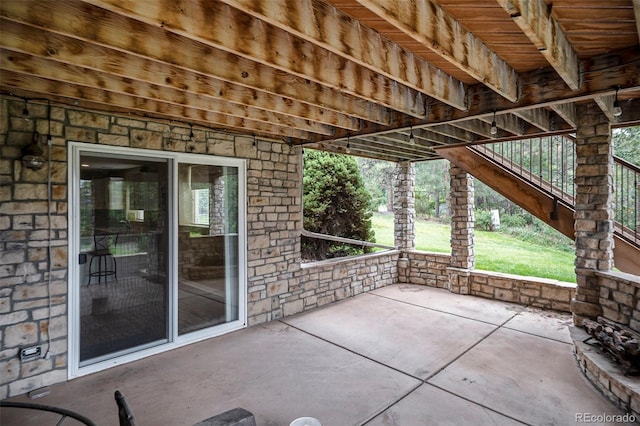 view of patio featuring stairs