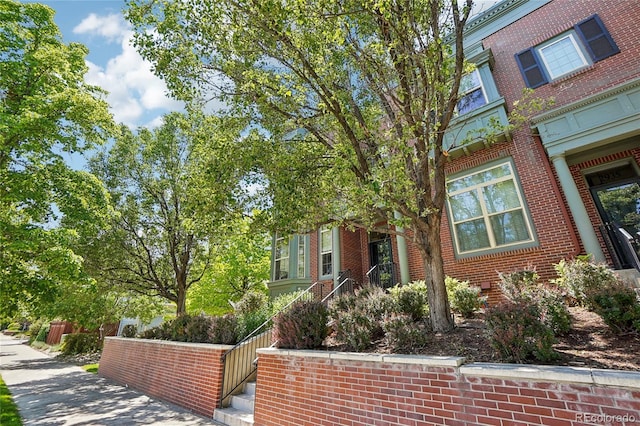2933 Central Park Blvd, Denver, CO 80238 - view of front of home with brick siding