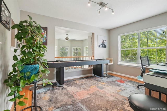 2933 Central Park Blvd, Denver, CO 80238 - office area featuring plenty of natural light, baseboards, and a ceiling fan
