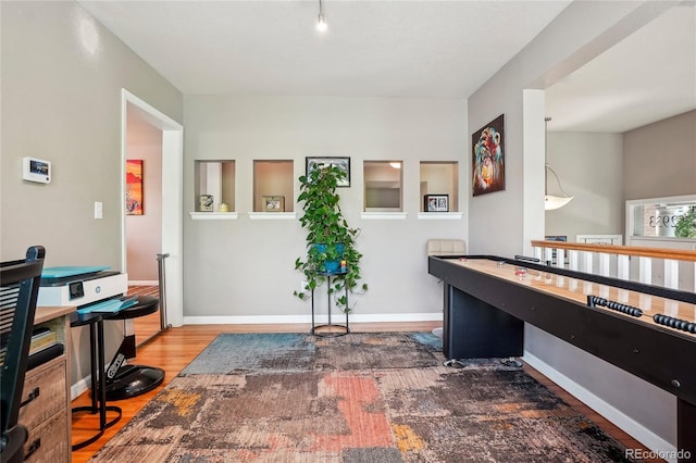 2933 Central Park Blvd, Denver, CO 80238 - playroom featuring wood finished floors, a desk, and baseboards