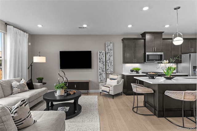 living room featuring light wood-type flooring