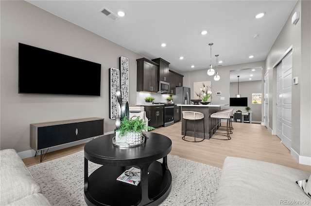 living room with light wood-type flooring