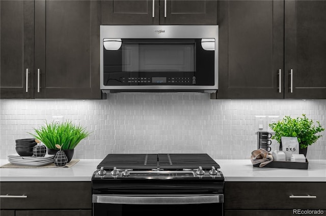 kitchen with black range with gas stovetop, dark brown cabinets, and decorative backsplash