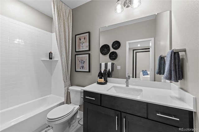 full bathroom featuring toilet, vanity, and tiled shower / bath combo