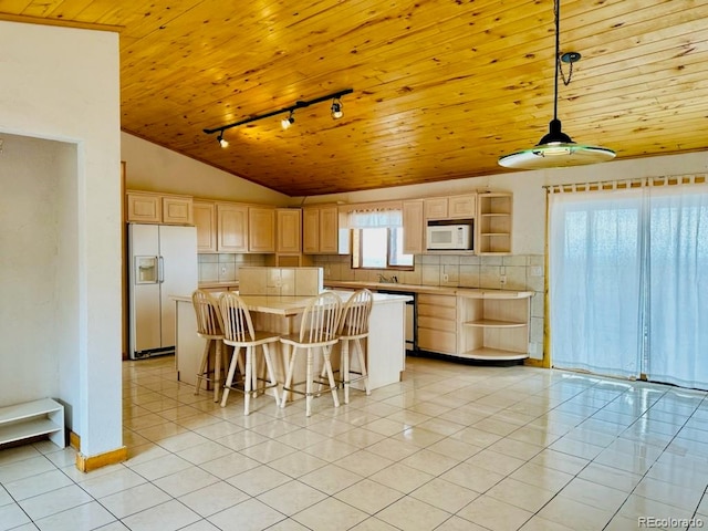 kitchen featuring wood ceiling, white appliances, a kitchen island, and light brown cabinets