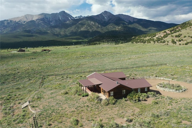 mountain view featuring a rural view