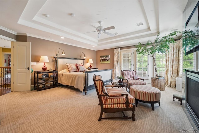 5335 E 2nd Ave, Denver, CO 80220 - bedroom featuring a raised ceiling, light colored carpet, multiple windows, recessed lighting, and ornamental molding