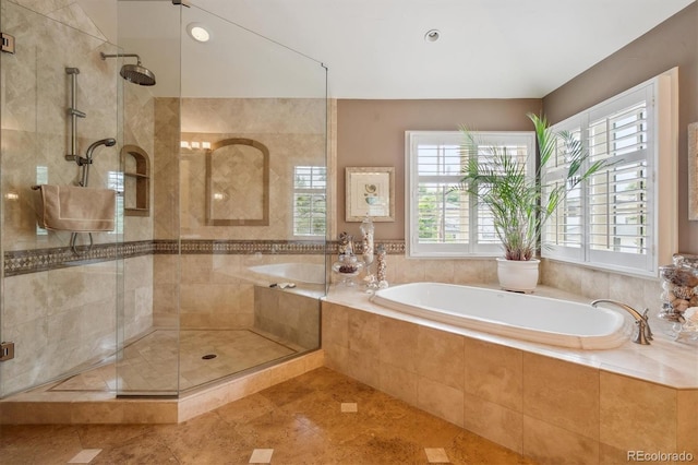 5335 E 2nd Ave, Denver, CO 80220 - full bathroom with tiled shower, a bath, plenty of natural light, and tile patterned flooring