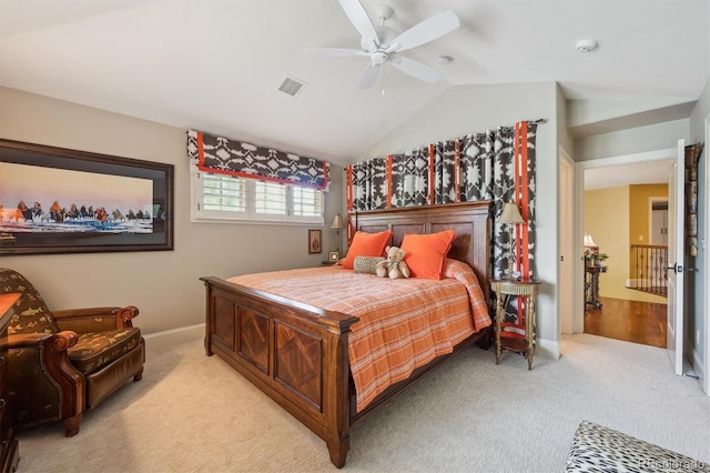 5335 E 2nd Ave, Denver, CO 80220 - bedroom with light colored carpet, vaulted ceiling, baseboards, and ceiling fan