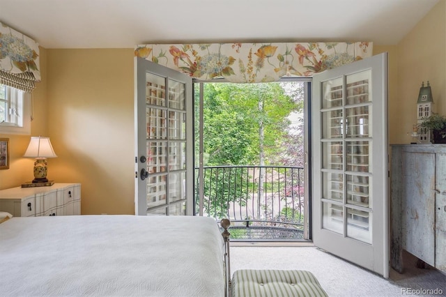 5335 E 2nd Ave, Denver, CO 80220 - carpeted bedroom featuring access to exterior