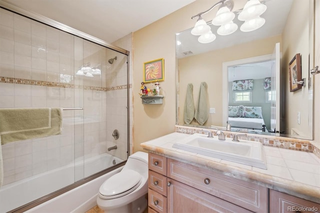 5335 E 2nd Ave, Denver, CO 80220 - bathroom with connected bathroom, combined bath / shower with glass door, vanity, toilet, and a chandelier