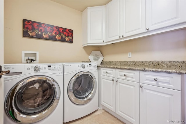 5335 E 2nd Ave, Denver, CO 80220 - washroom with cabinet space, separate washer and dryer, and light tile patterned floors