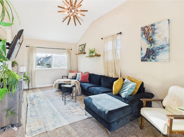 living area with baseboards and lofted ceiling