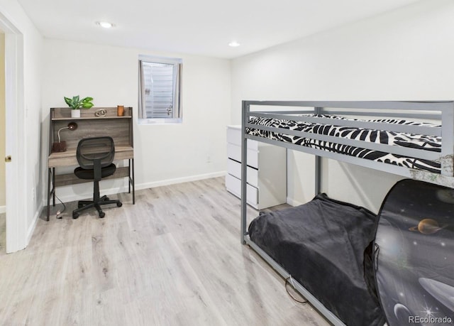 bedroom with recessed lighting, baseboards, and wood finished floors