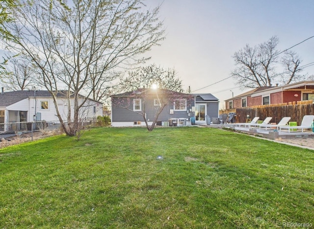 view of yard with a patio and fence