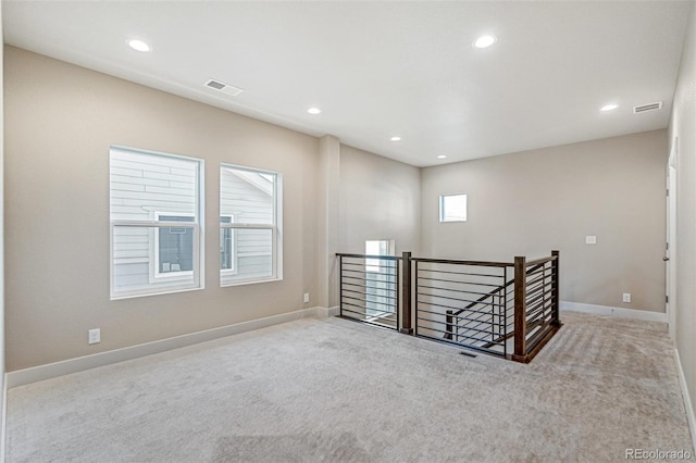 view of carpeted spare room