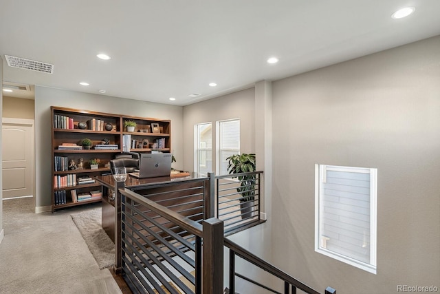 home office featuring light colored carpet, visible vents, and recessed lighting