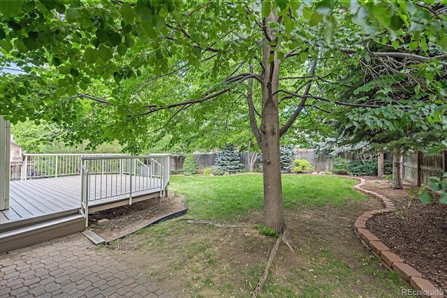 9406 Troon Village Way, Lone Tree, CO 80124 - fenced backyard with a wooden deck