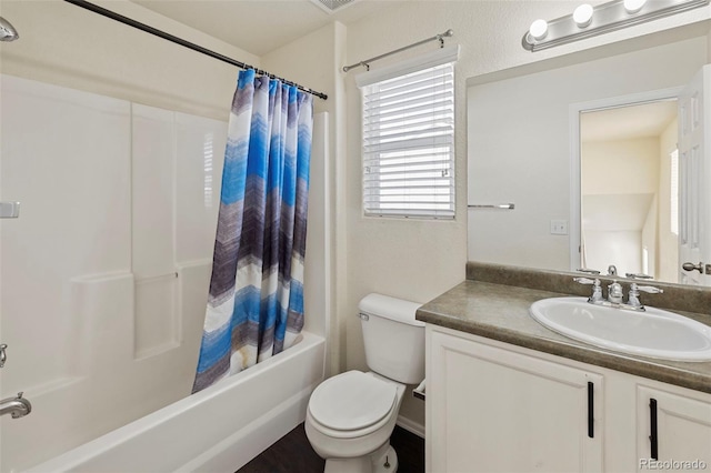 full bathroom with toilet, shower / tub combo, and vanity