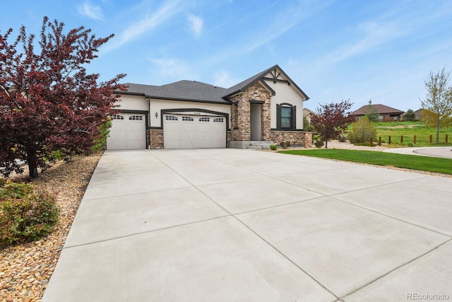 21376 E Union Pl, Aurora, CO 80015 - view of front of property featuring a garage, stucco siding, driveway, stone siding, and a front lawn