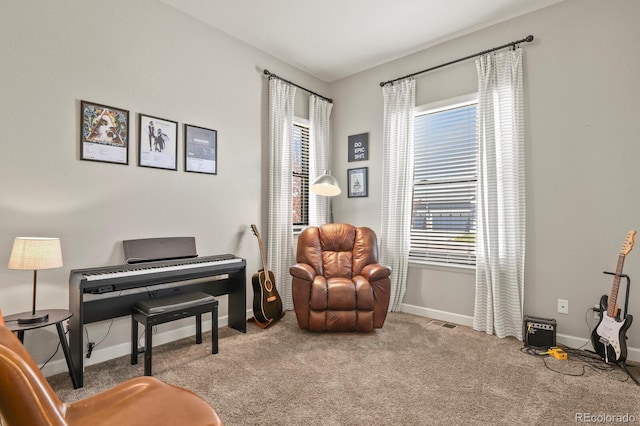 21376 E Union Pl, Aurora, CO 80015 - living area featuring baseboards and carpet flooring