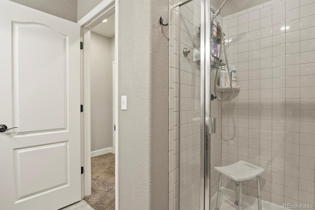 21376 E Union Pl, Aurora, CO 80015 - bathroom with a stall shower and a textured wall