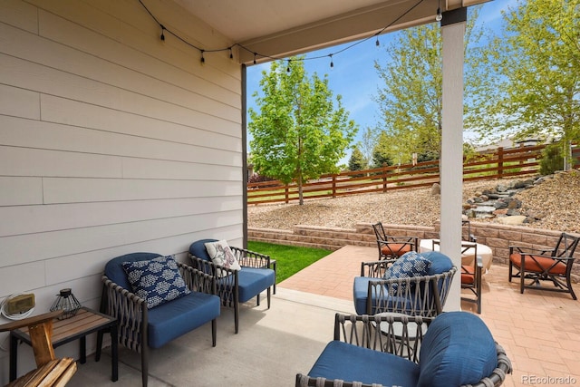 21376 E Union Pl, Aurora, CO 80015 - view of patio featuring a fenced backyard and an outdoor living space