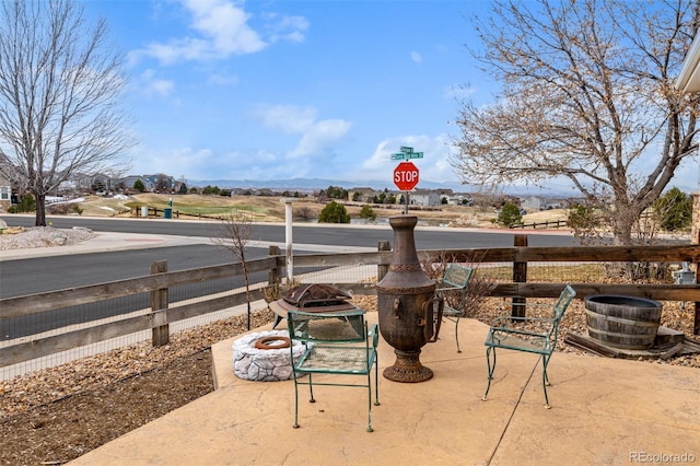 view of patio / terrace featuring a fire pit