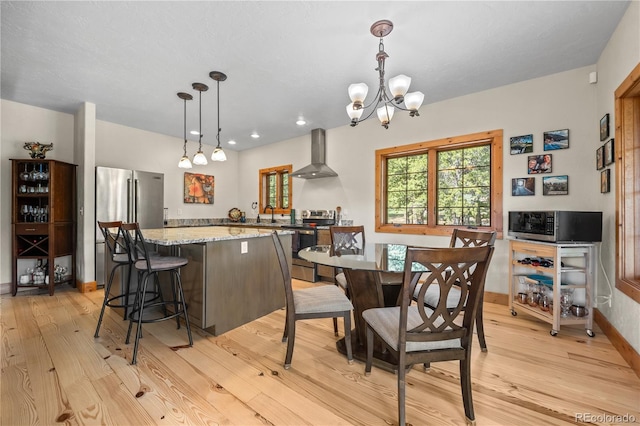 715 Clark Rd, Bailey, CO 80421 - dining space featuring light wood-style floors, a chandelier, and recessed lighting