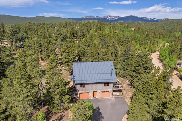 715 Clark Rd, Bailey, CO 80421 - aerial view of property and surrounding area featuring a forest and mountains