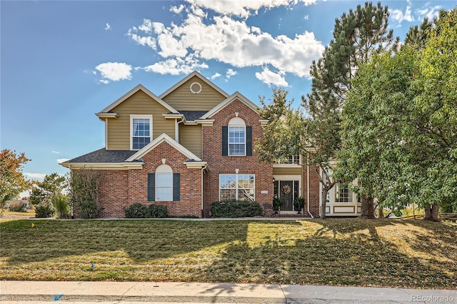 view of front property featuring a front yard