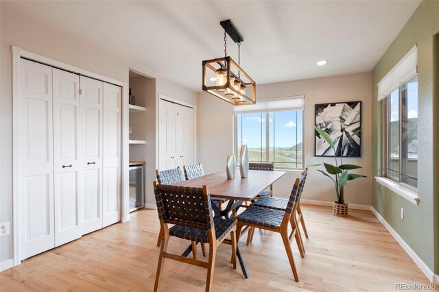 415 Butte Pkwy, Golden, CO 80403 - dining room with light wood-style flooring, baseboards, and recessed lighting