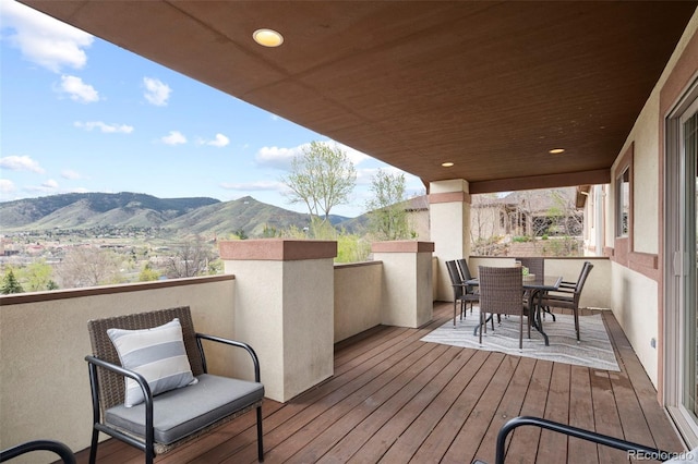 415 Butte Pkwy, Golden, CO 80403 - wooden terrace with a mountain view and outdoor dining space