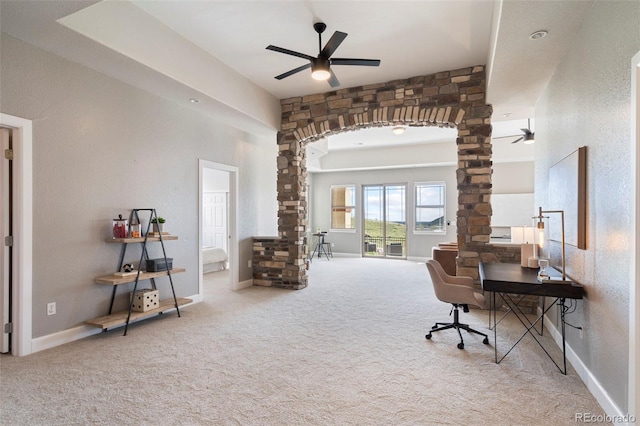 415 Butte Pkwy, Golden, CO 80403 - carpeted home office with a ceiling fan, arched walkways, and baseboards