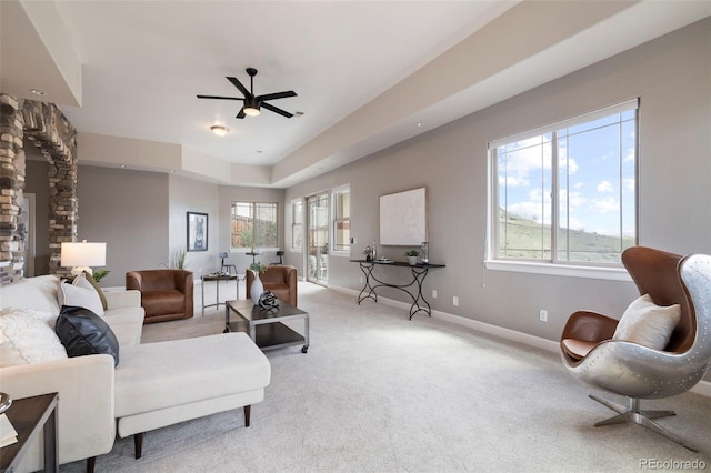 415 Butte Pkwy, Golden, CO 80403 - living room with carpet flooring, ceiling fan, plenty of natural light, and baseboards