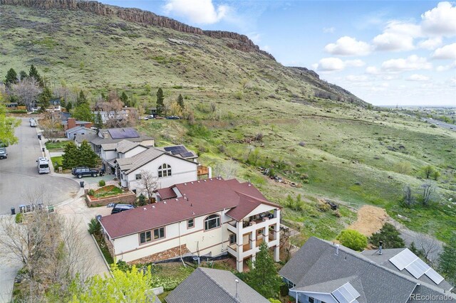 415 Butte Pkwy, Golden, CO 80403 - aerial view of residential area featuring mountains