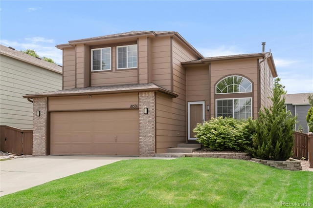 10591 Hyacinth St, Highlands Ranch, CO 80129 - traditional-style house featuring a garage, driveway, and brick siding