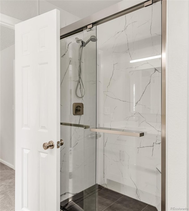 10591 Hyacinth St, Highlands Ranch, CO 80129 - bathroom featuring a marble finish shower