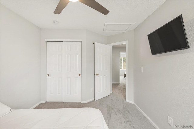 10591 Hyacinth St, Highlands Ranch, CO 80129 - unfurnished bedroom featuring carpet flooring, a closet, attic access, and baseboards