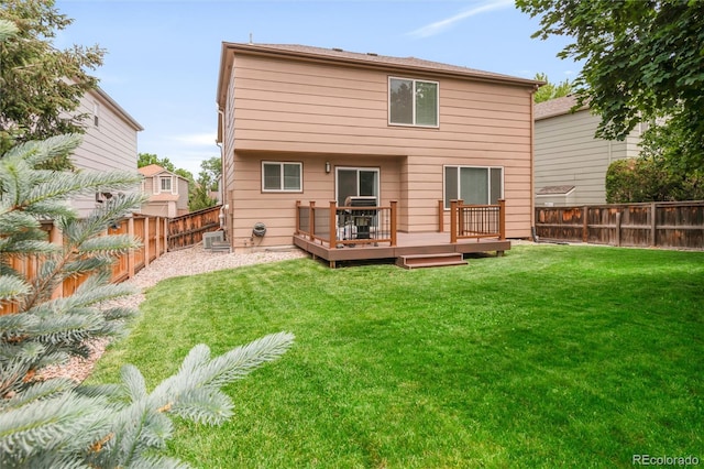 10591 Hyacinth St, Highlands Ranch, CO 80129 - back of property featuring a wooden deck