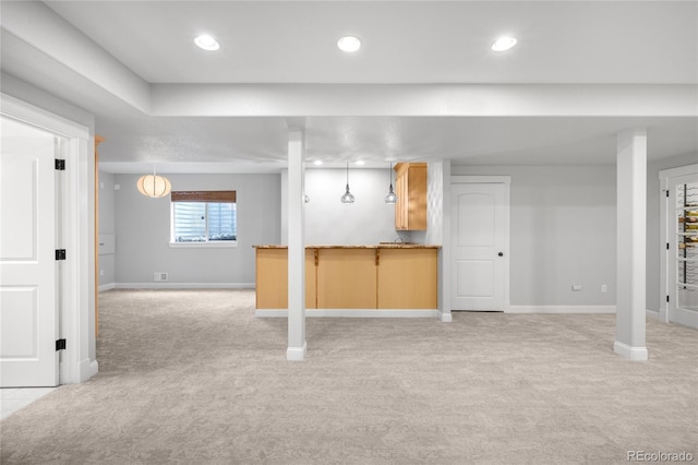 interior space featuring recessed lighting, light colored carpet, and baseboards