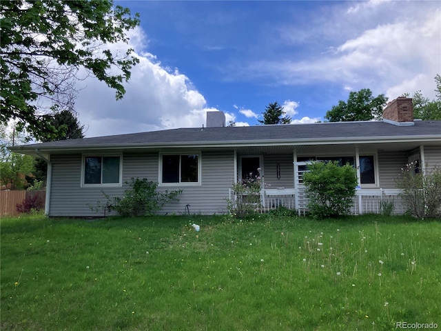 3910 E Orchard Rd, Centennial, CO 80121 - view of front of home featuring a chimney and a front lawn