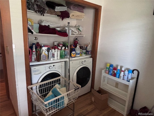 3910 E Orchard Rd, Centennial, CO 80121 - laundry area with washer and clothes dryer and wood finished floors