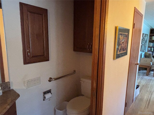 3910 E Orchard Rd, Centennial, CO 80121 - bathroom with vanity and wood finished floors