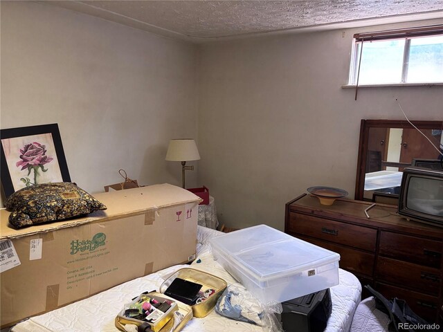 3910 E Orchard Rd, Centennial, CO 80121 - bedroom with a textured ceiling