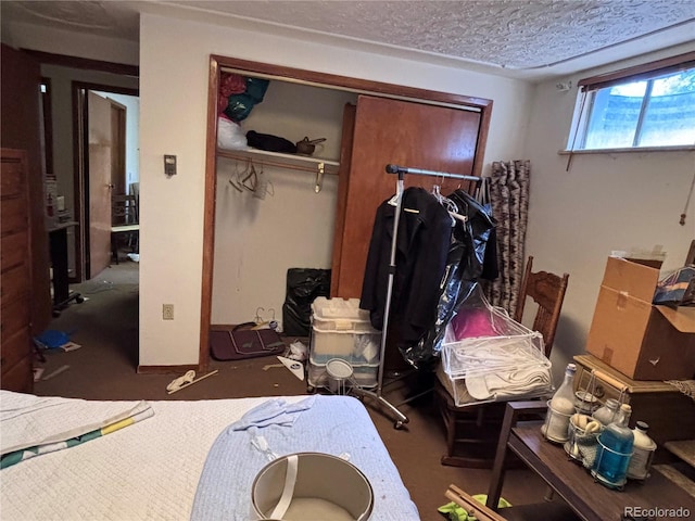 3910 E Orchard Rd, Centennial, CO 80121 - bedroom with a closet and a textured ceiling