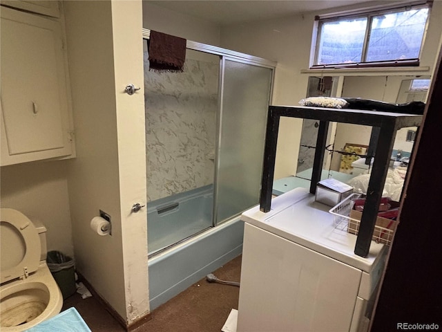 3910 E Orchard Rd, Centennial, CO 80121 - bathroom featuring toilet and combined bath / shower with glass door